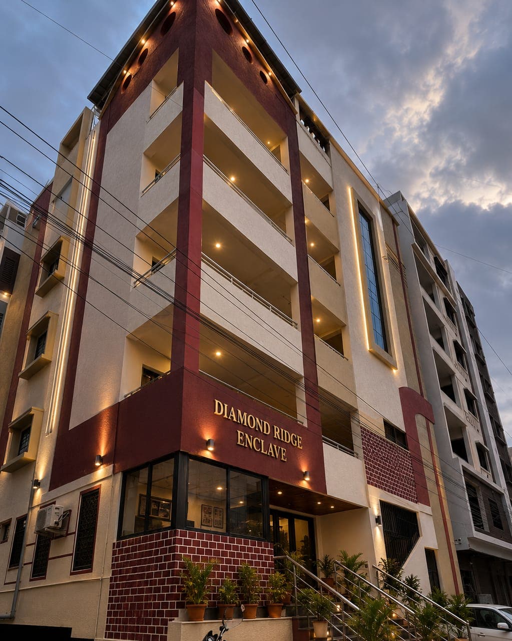 The building corner lit up at dusk