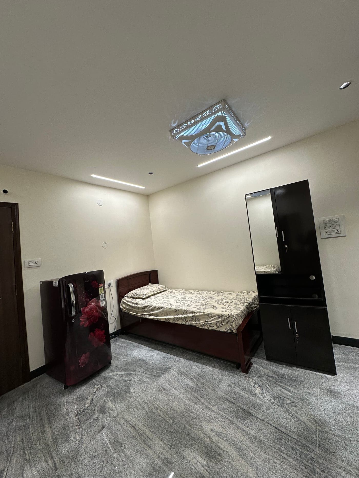 Twin beds with fridge
