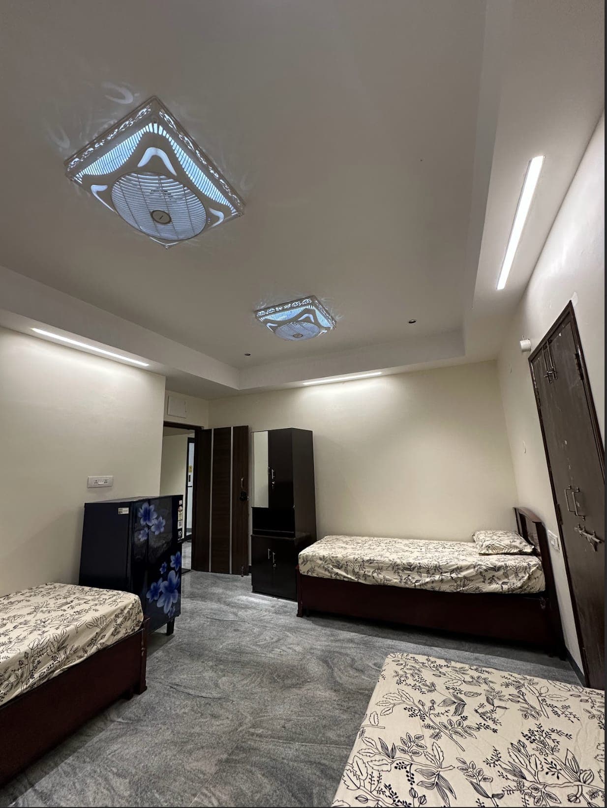 Two single beds — the furnished-room standard