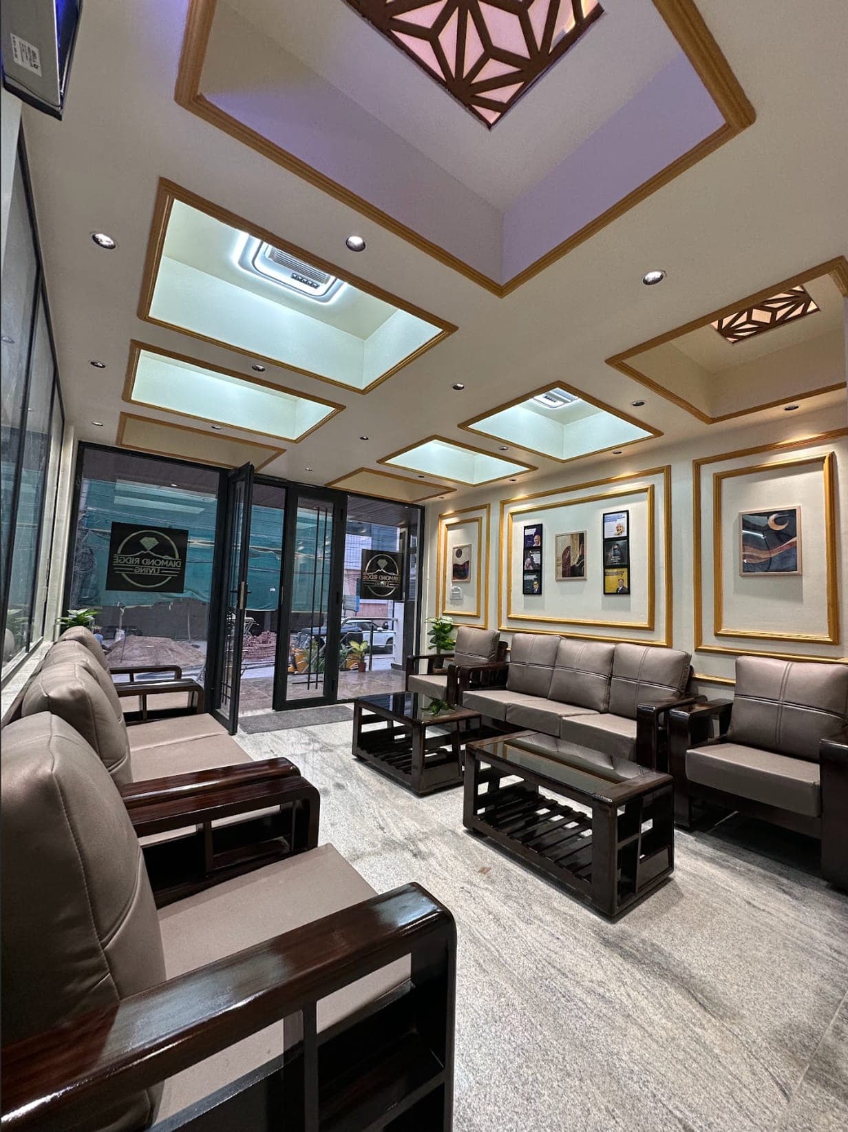 The lounge at Diamond Ridge Living with its gold coffered ceiling